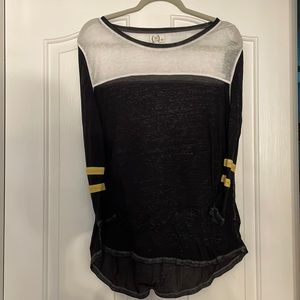 Maurices size large shirt. See thru material. Super comfy!